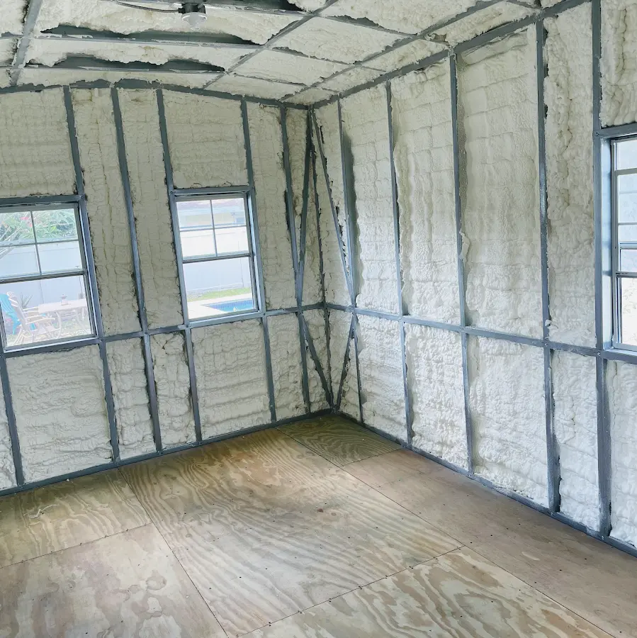 Closed-cell spray foam insulation applied to wall cavities in a residential project in Bennington