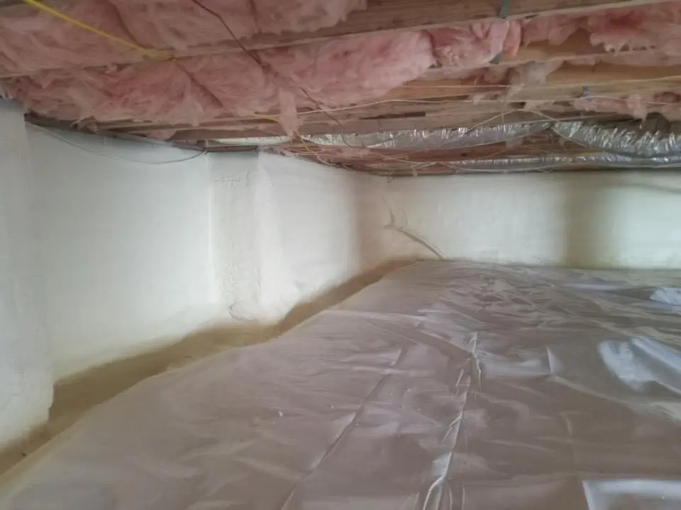 Crawl space encapsulation with closed-cell spray foam for Commercial Roof Restoration in Bennington